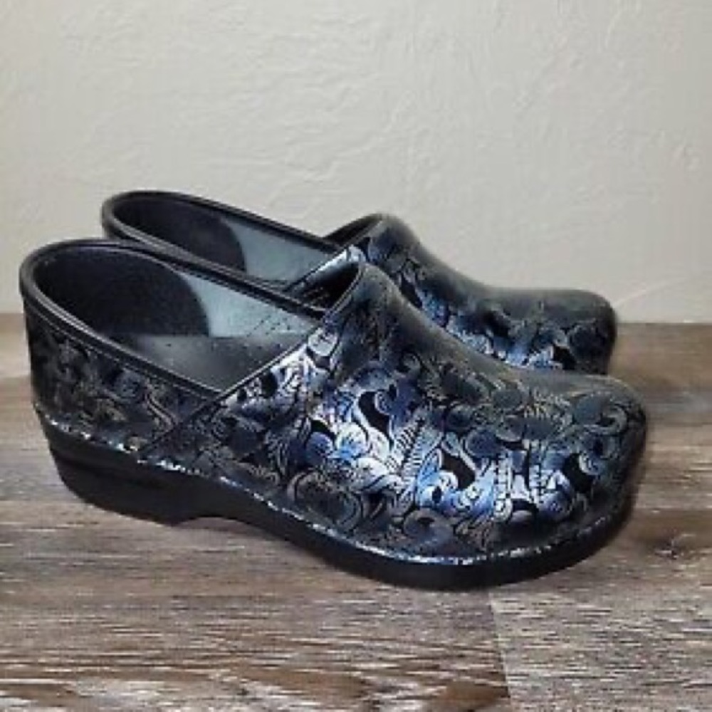 Dansko nurse clogs, size 9.